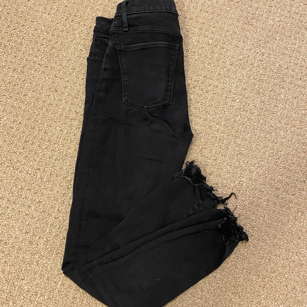 Black skinny jeans with frayed bottom